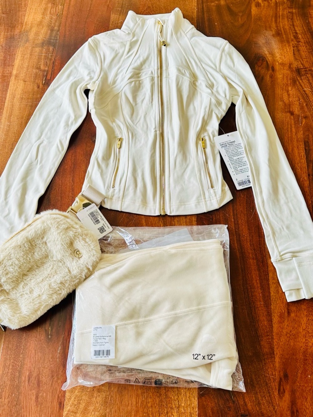 lululemon Light Ivory Cream / Gold Define Nulu Cropped Jacket & Flare Pants Set